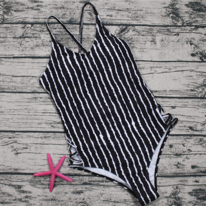 Conservative Swimsuit With Wavy Striped Triangle..